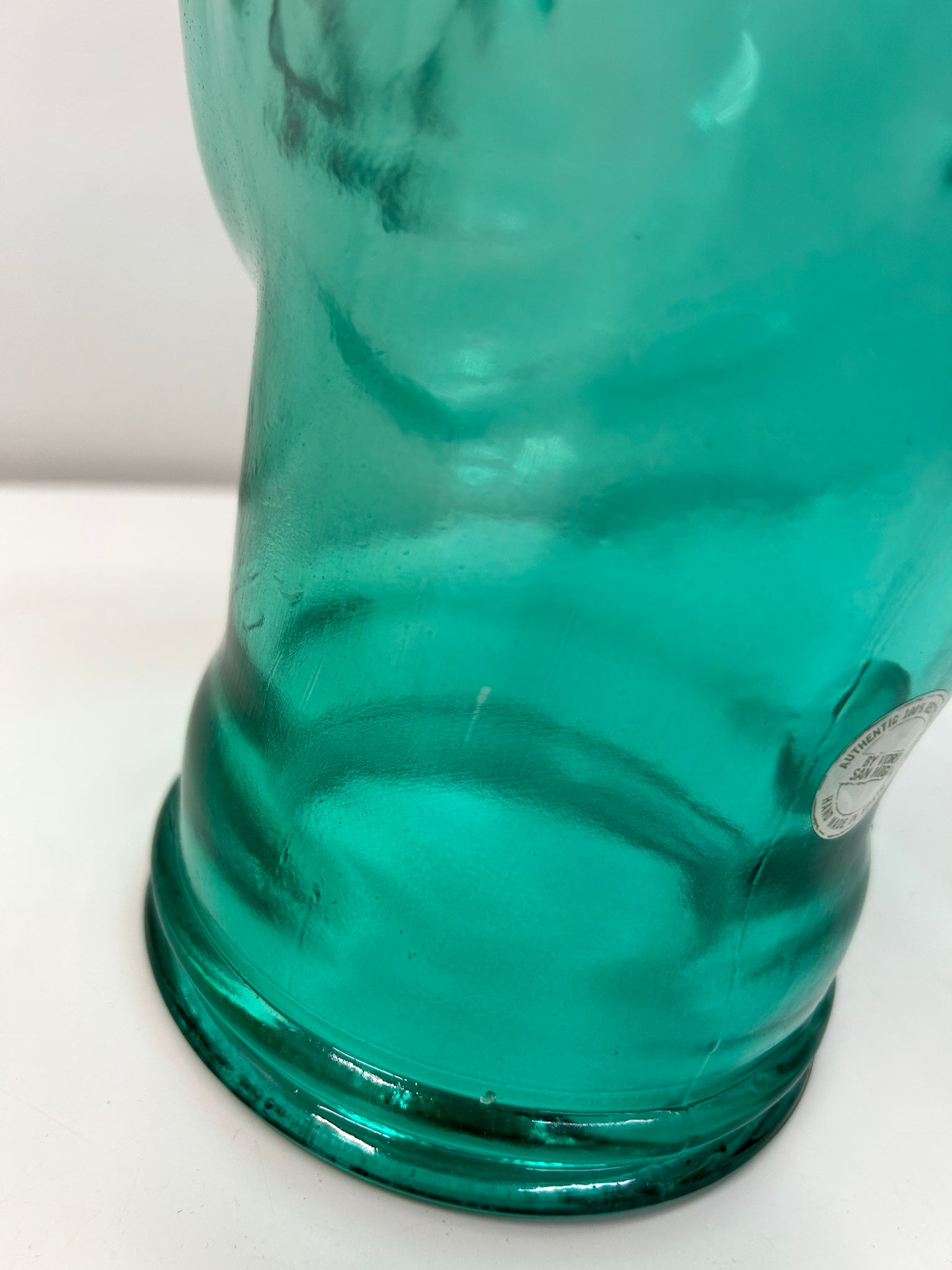 Turquoise blue glass mannequin head