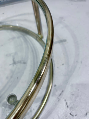 Golden brass & glass round swivel coffee table
