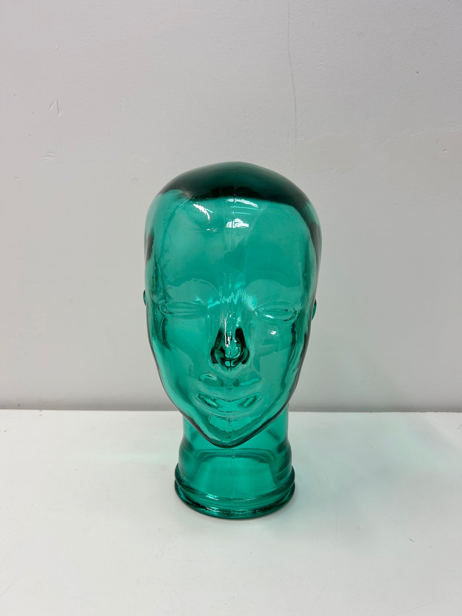 Turquoise blue glass mannequin head