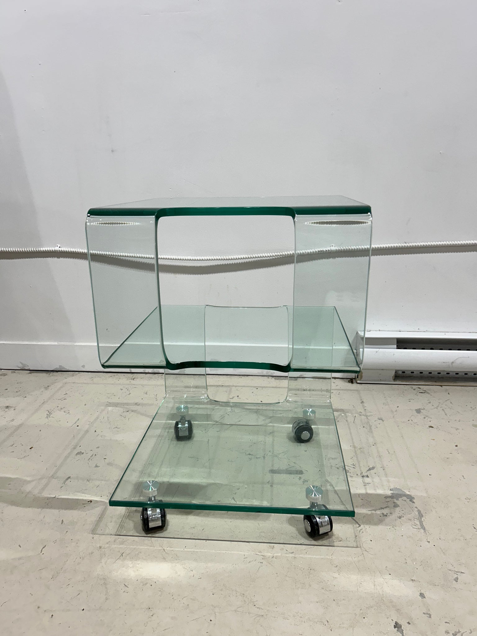 Modern tempered glass side table on wheels