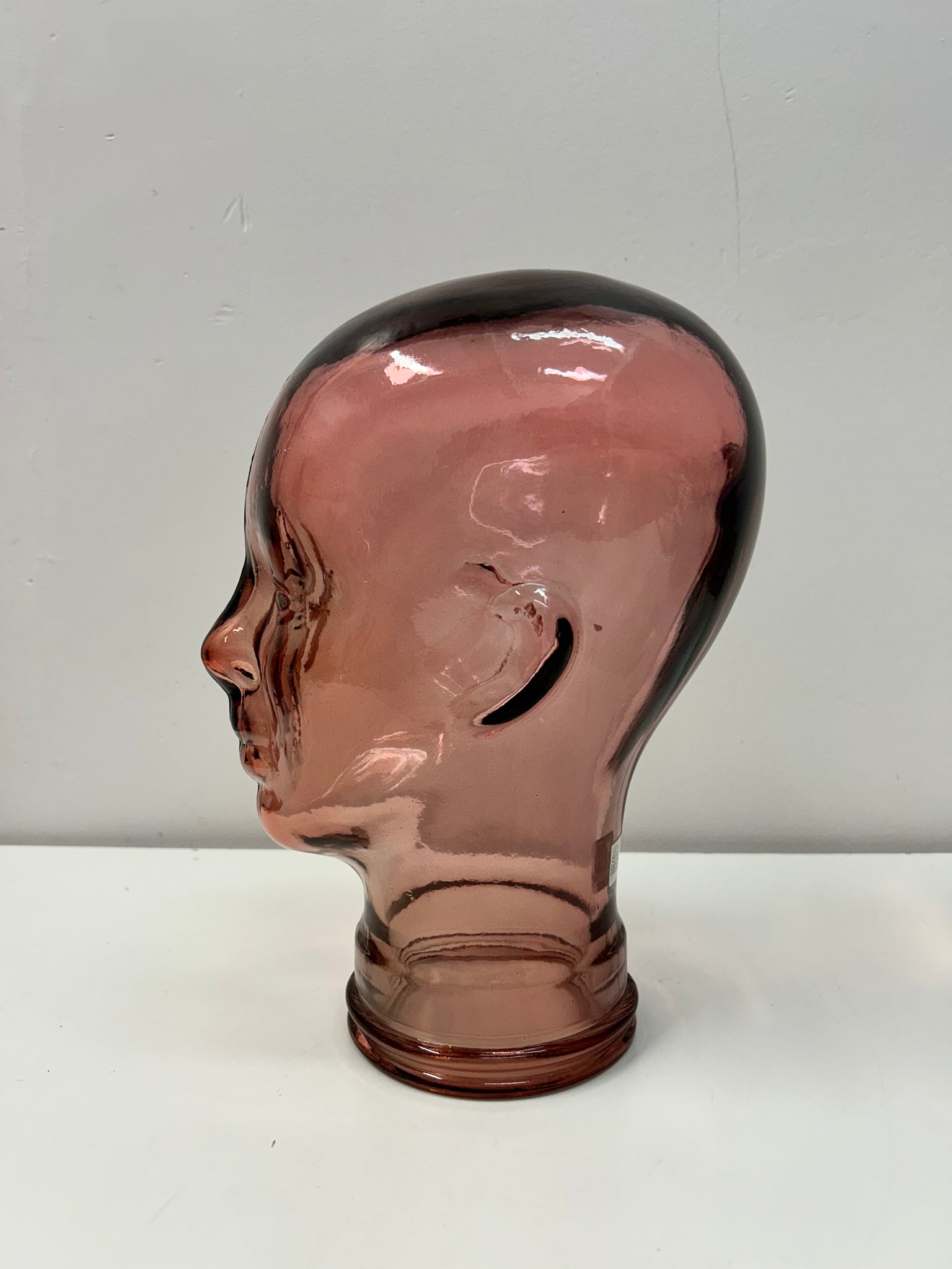 Purple-red glass mannequin head