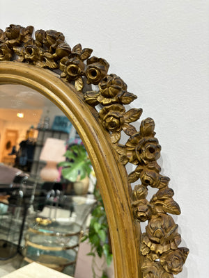 Miroir oval antique avec roses