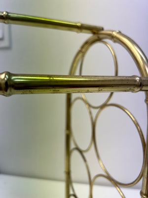 Small golden brass wine rack