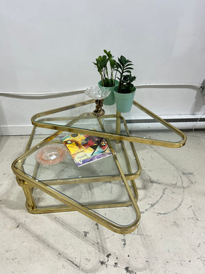 Golden brass & glass square coffee table with triangular swivel tablets