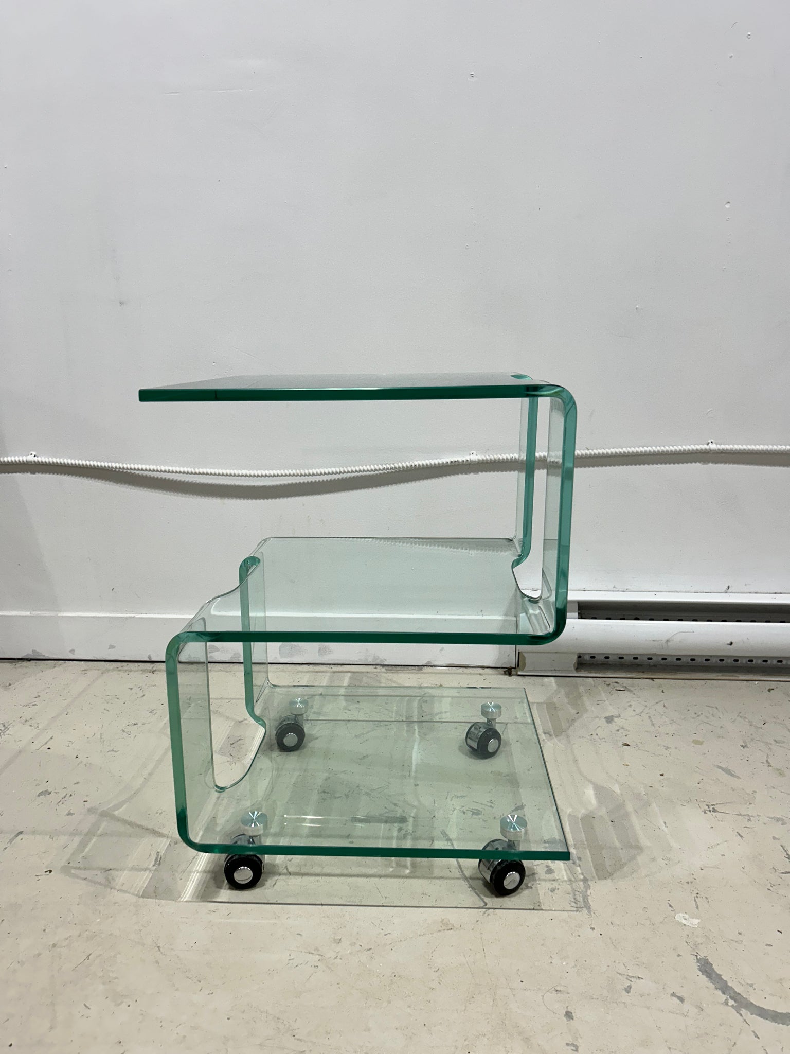 Modern tempered glass side table on wheels