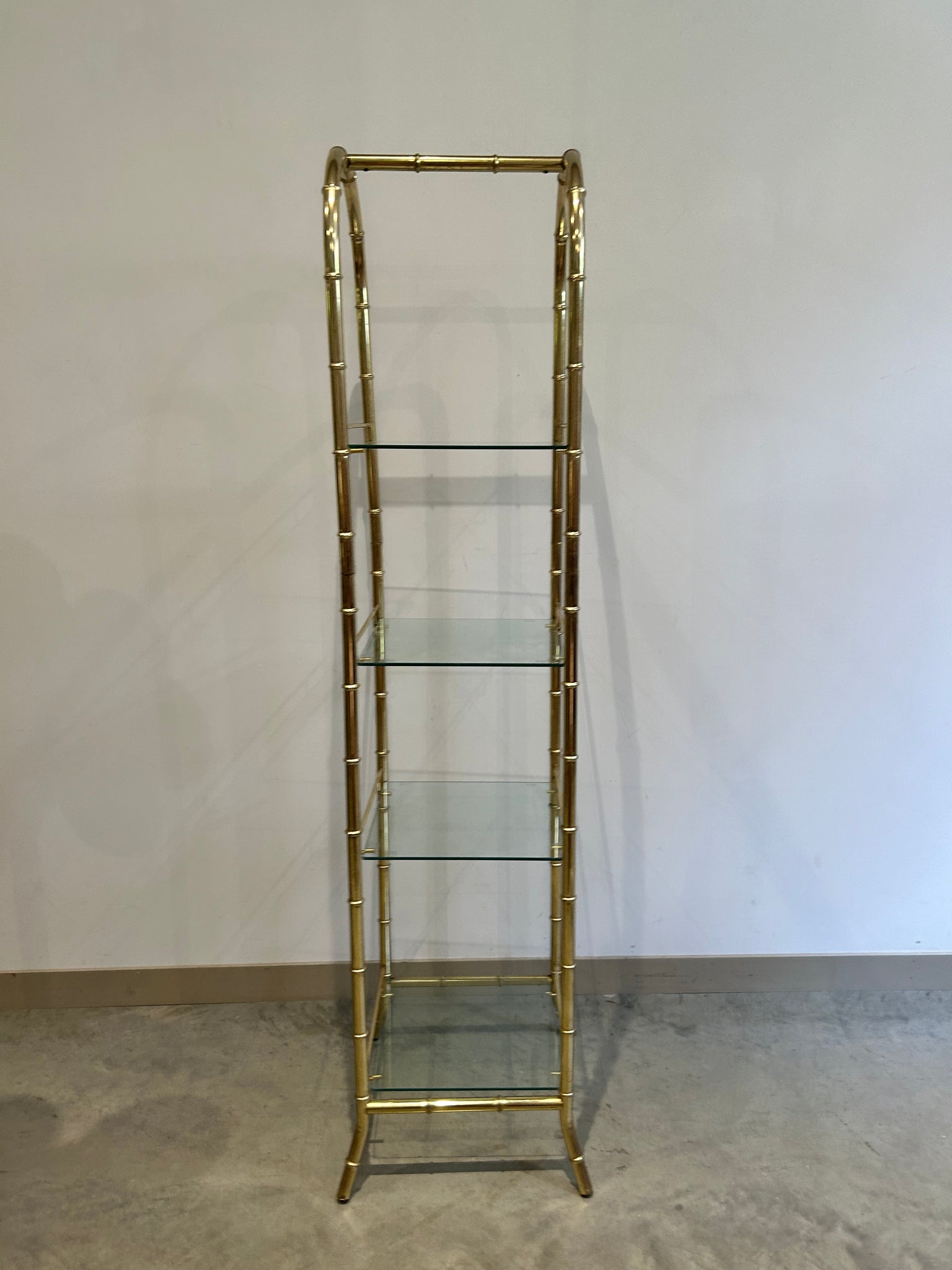 Slim golden brass & glass arched shelf