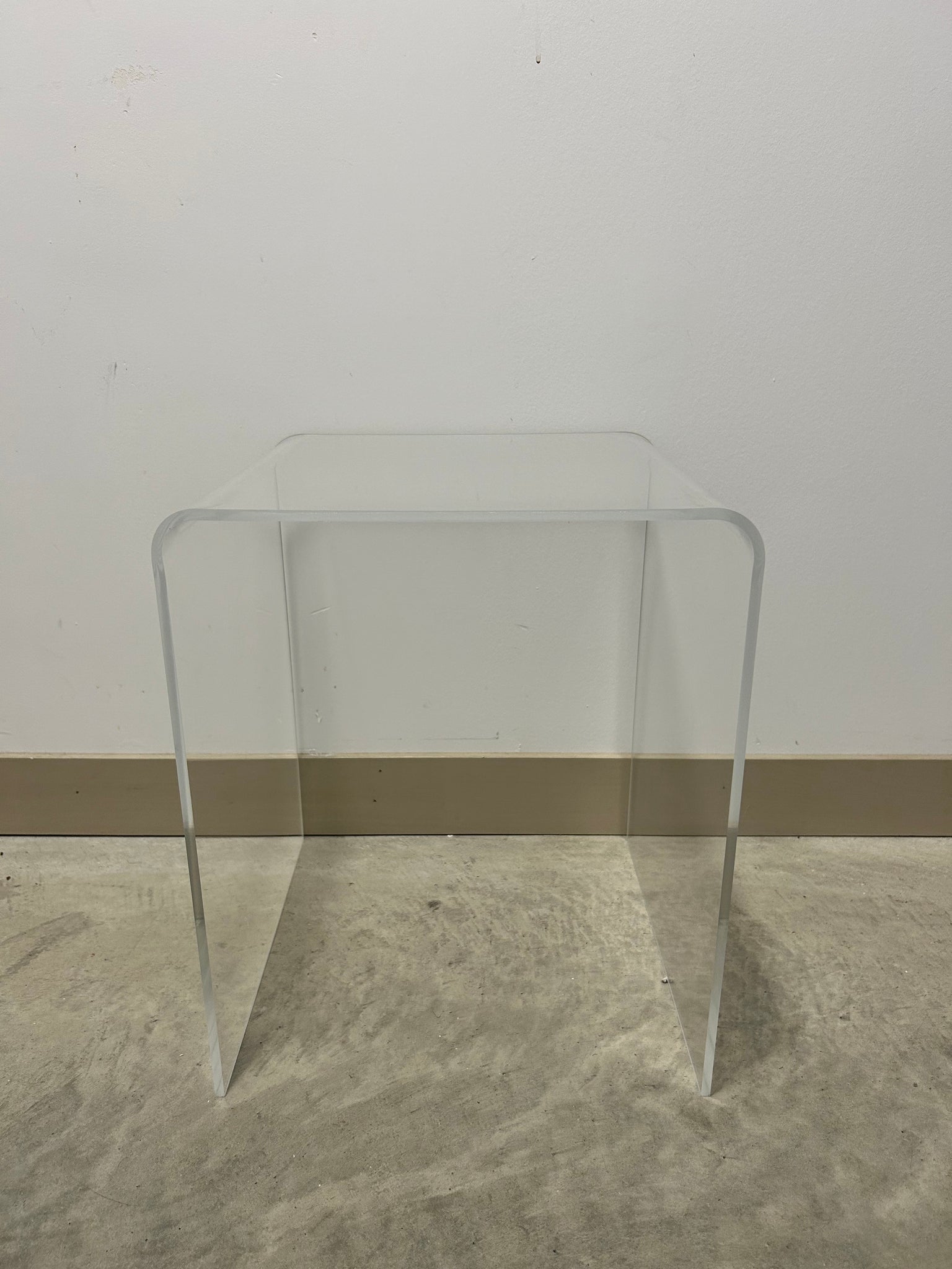 Duo of lucite waterfall nesting side tables