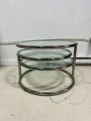 Chrome & glass round swivel coffee table