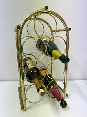 Small golden brass wine rack