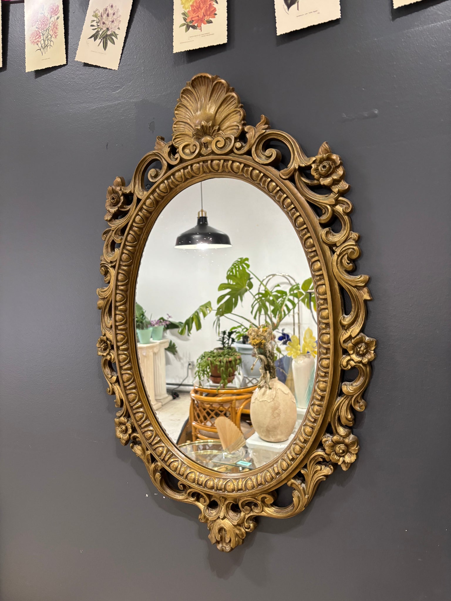 Miroir oval antique orné syroco