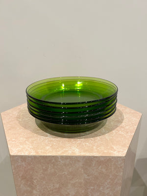 Selection of green glass plates and bowls