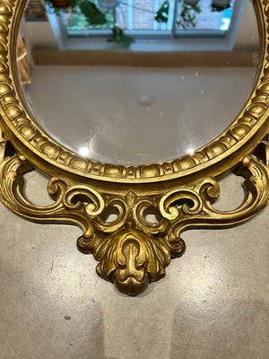 Ornate golden Syroco mirror