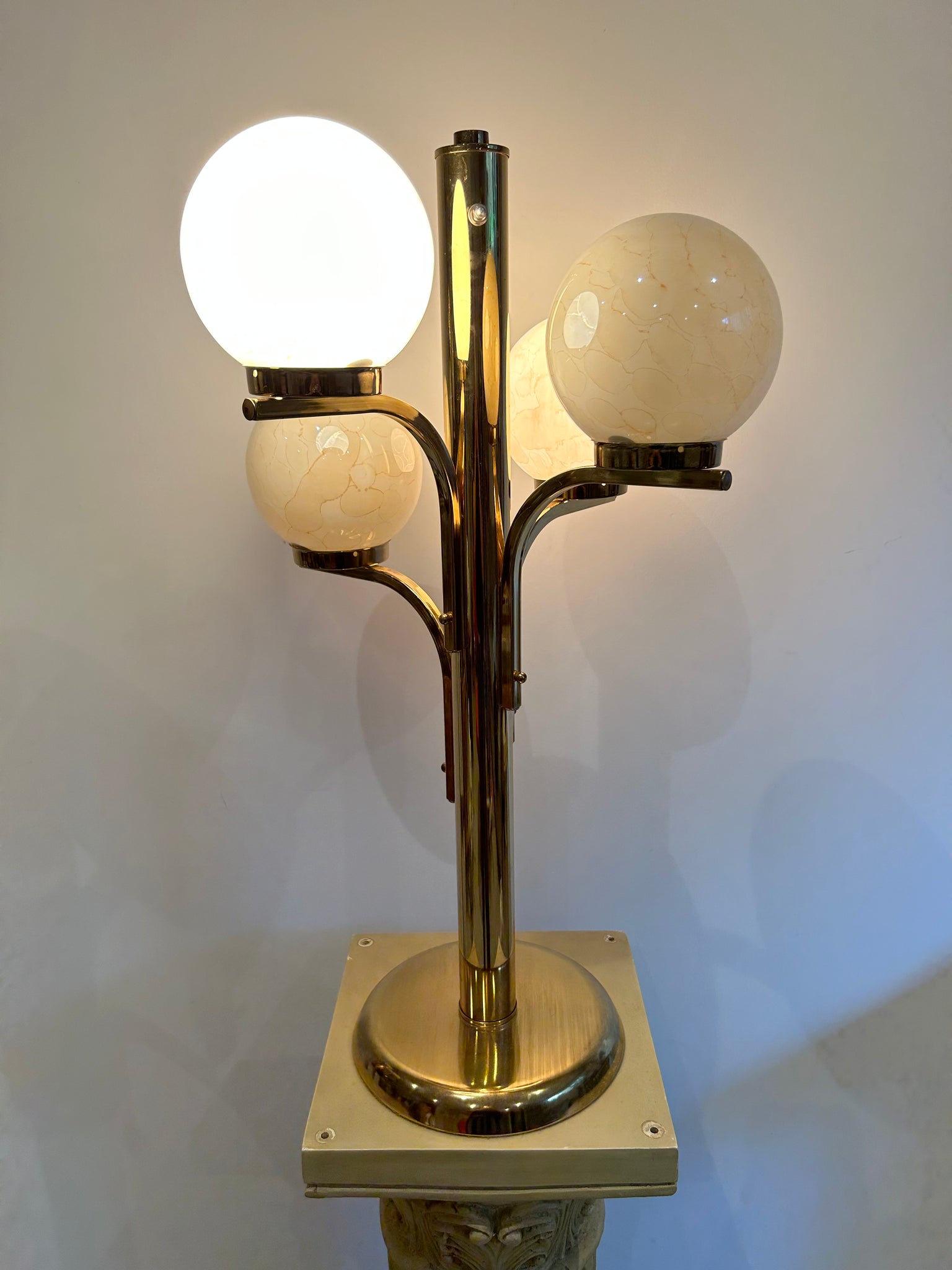 Marbled globes & golden brass table & floor lamps