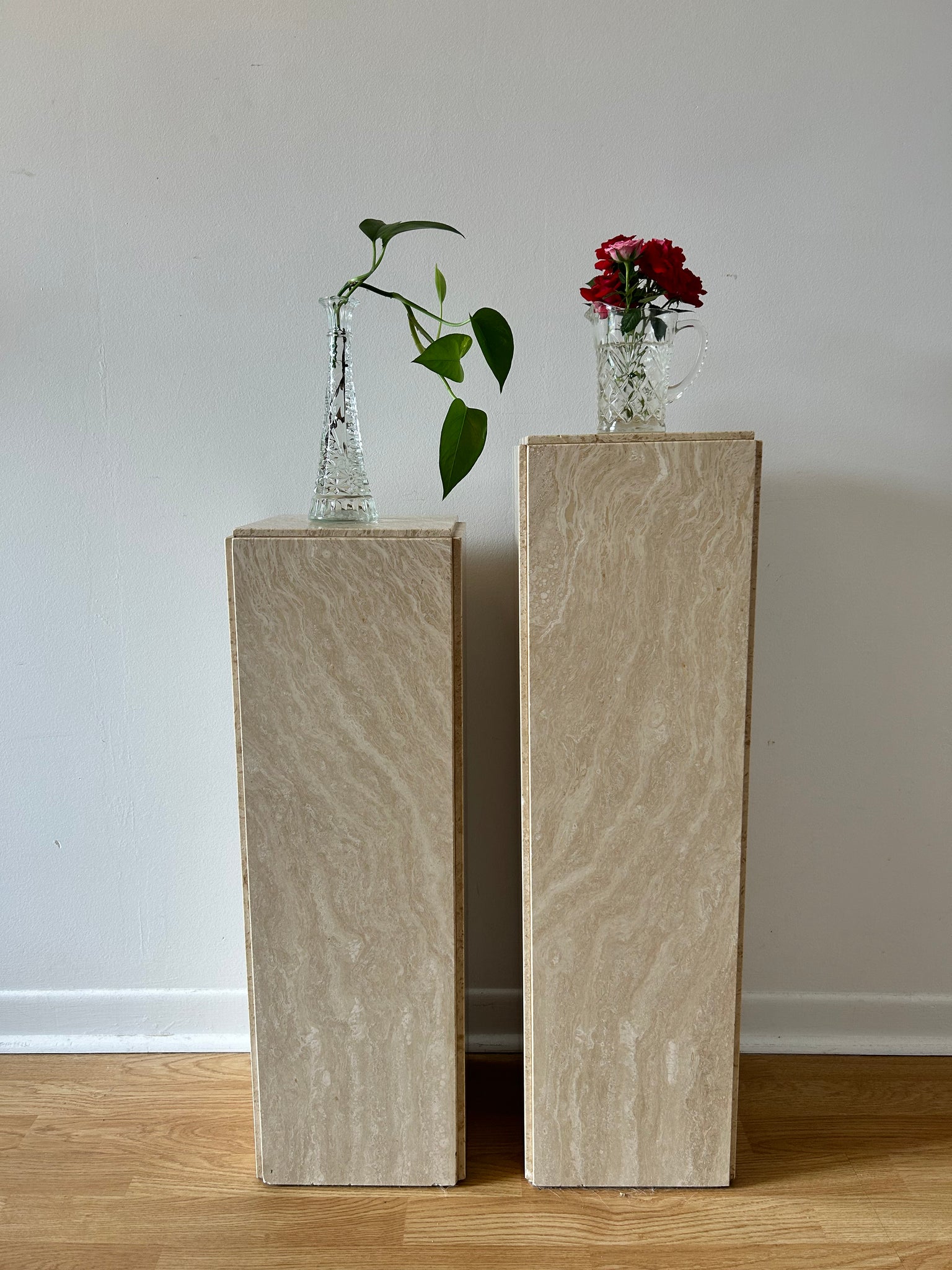 Marbled travertine stone podiums