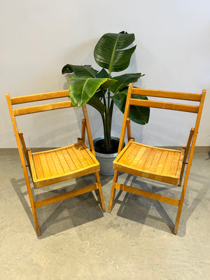 Pair of wooden folding chairs