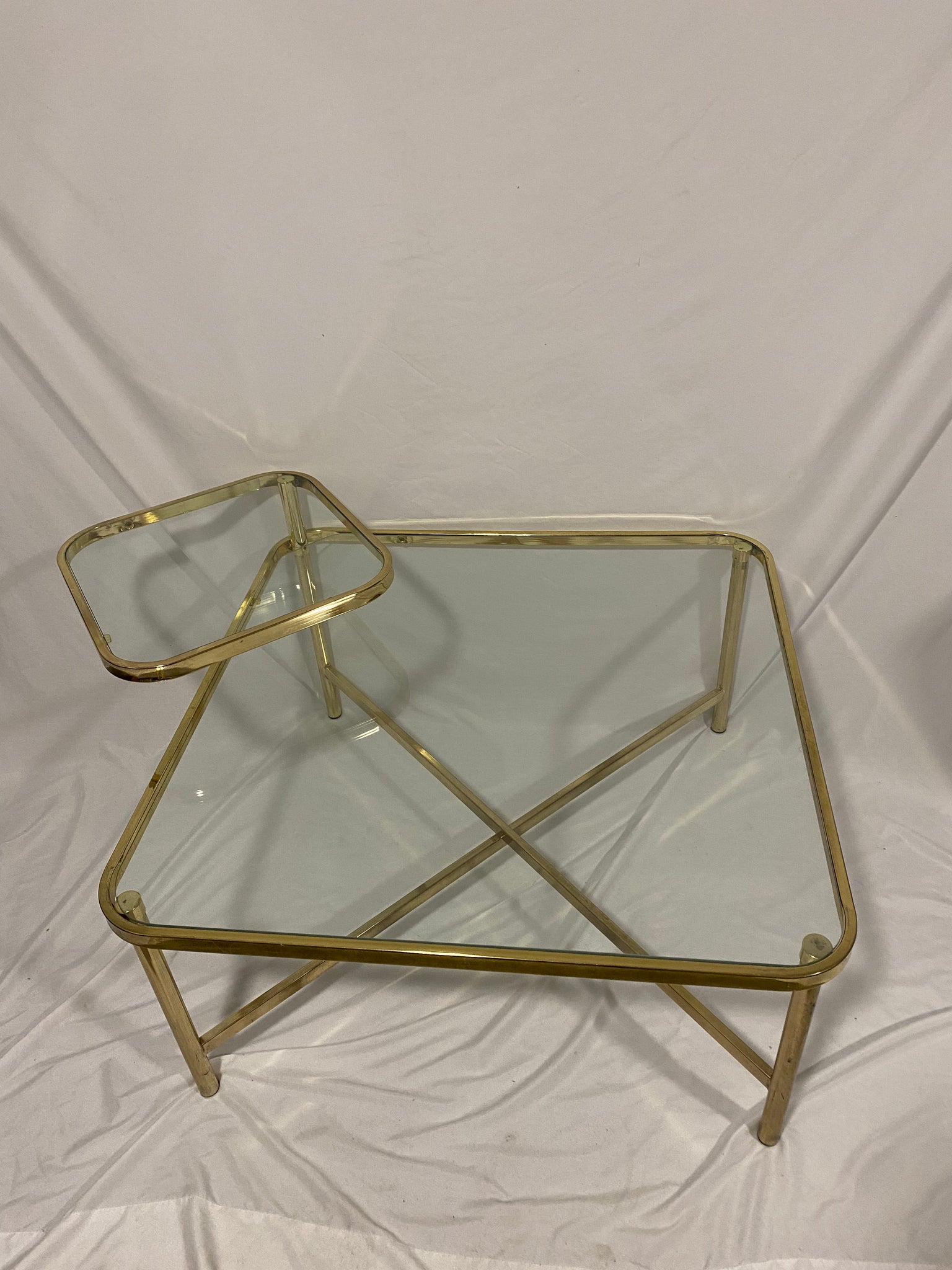 Golden brass square coffee table with swivel tablet