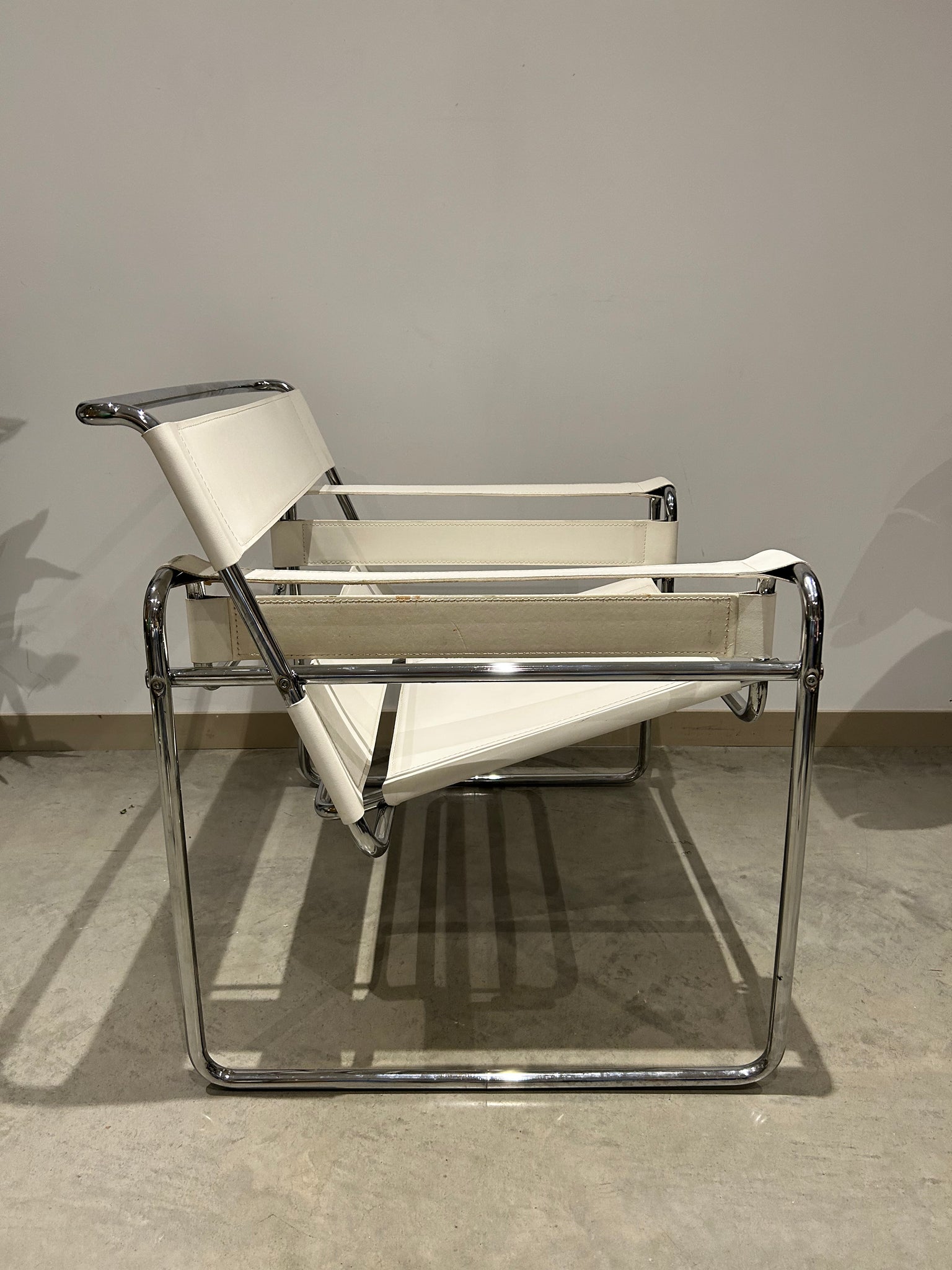 White Marcel Breuer Wassily style chairs
