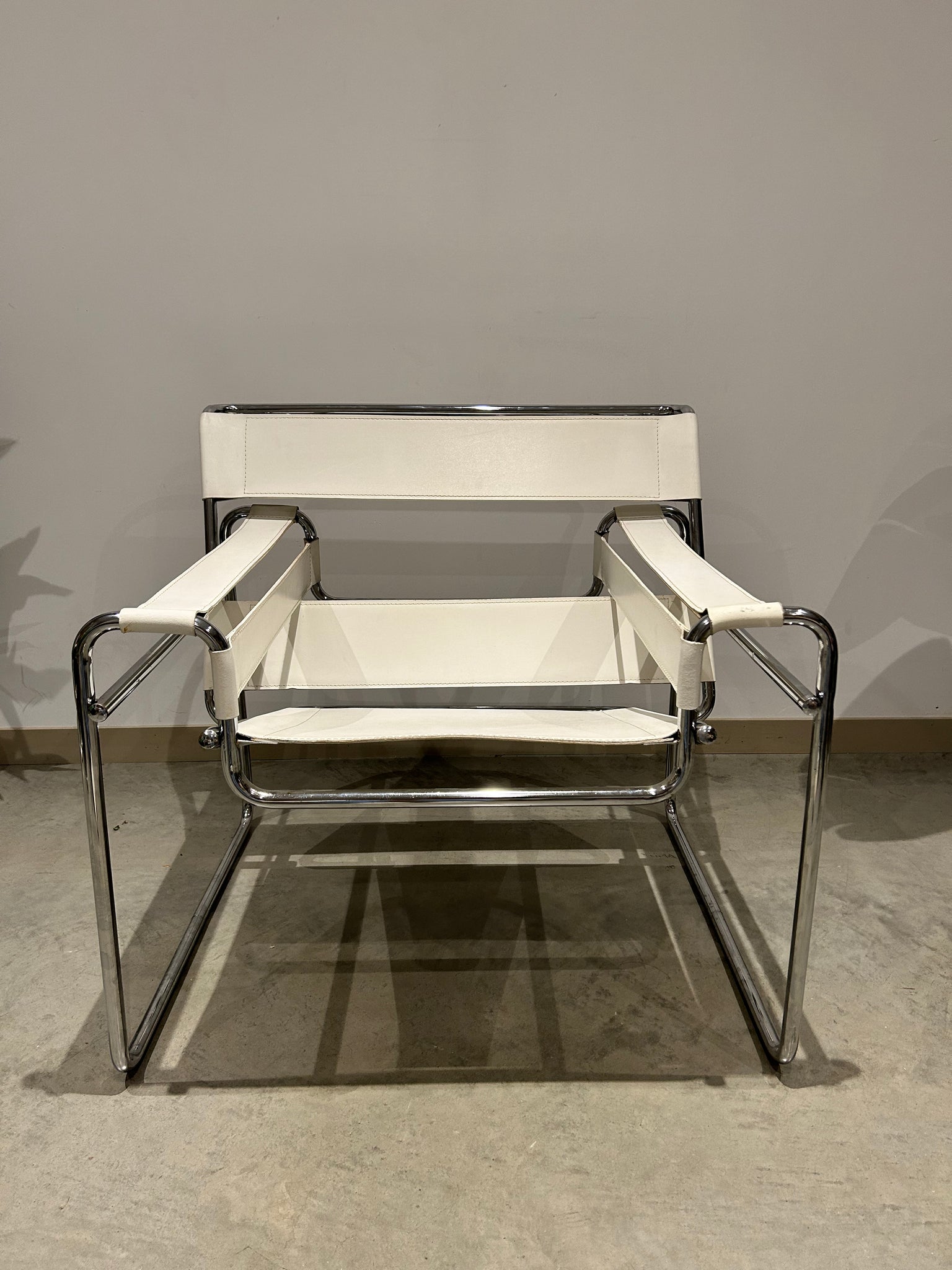 White Marcel Breuer Wassily style chairs