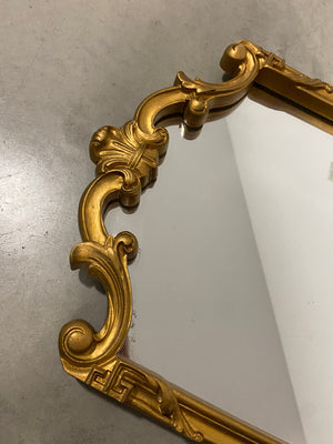 Ornate golden antique mirror