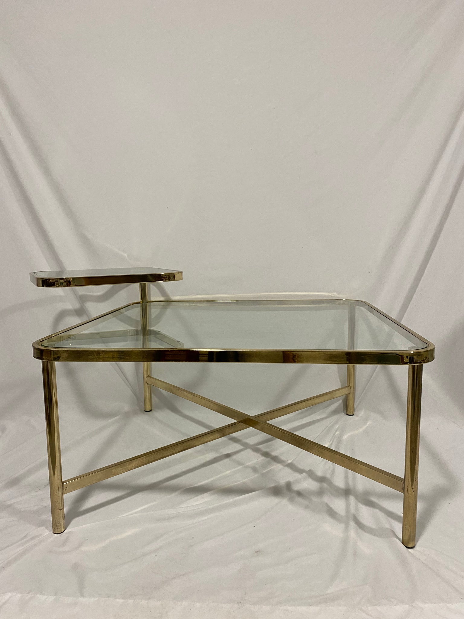 Golden brass square coffee table with swivel tablet