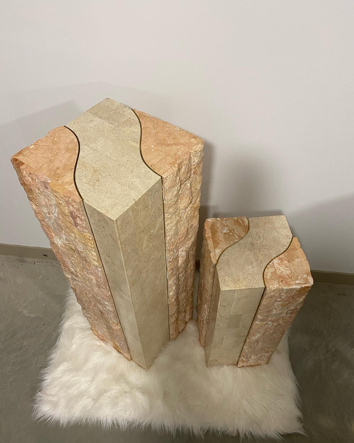 Pink tesselated stone podiums