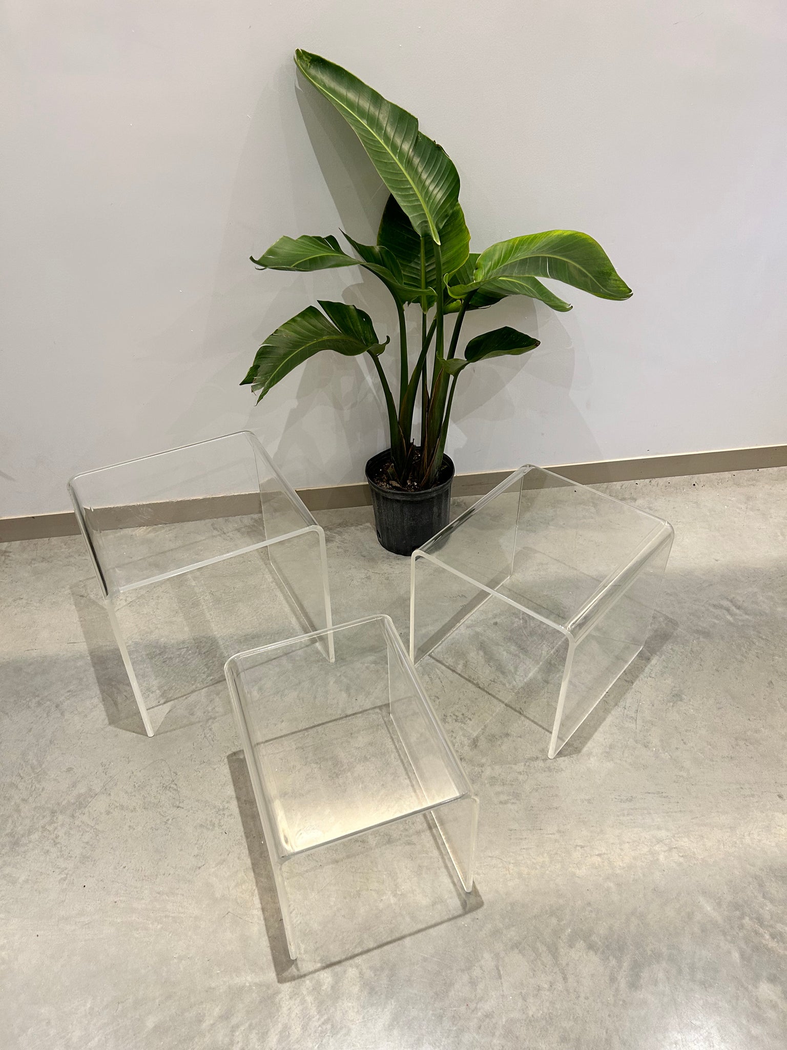 Trio of lucite waterfall nesting side tables