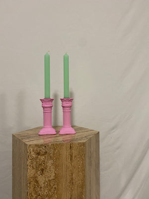 Hot pink plaster column candle holders