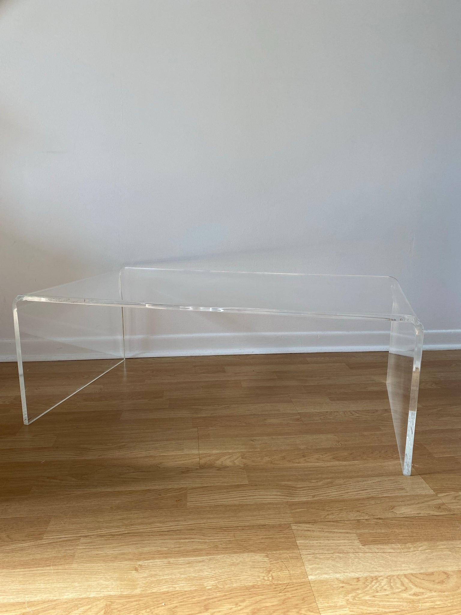 Lucite waterfall coffee table