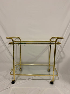 Golden brass bar cart