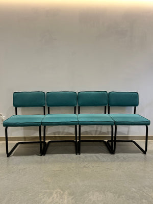 Teal felt & black metal cantilever chairs
