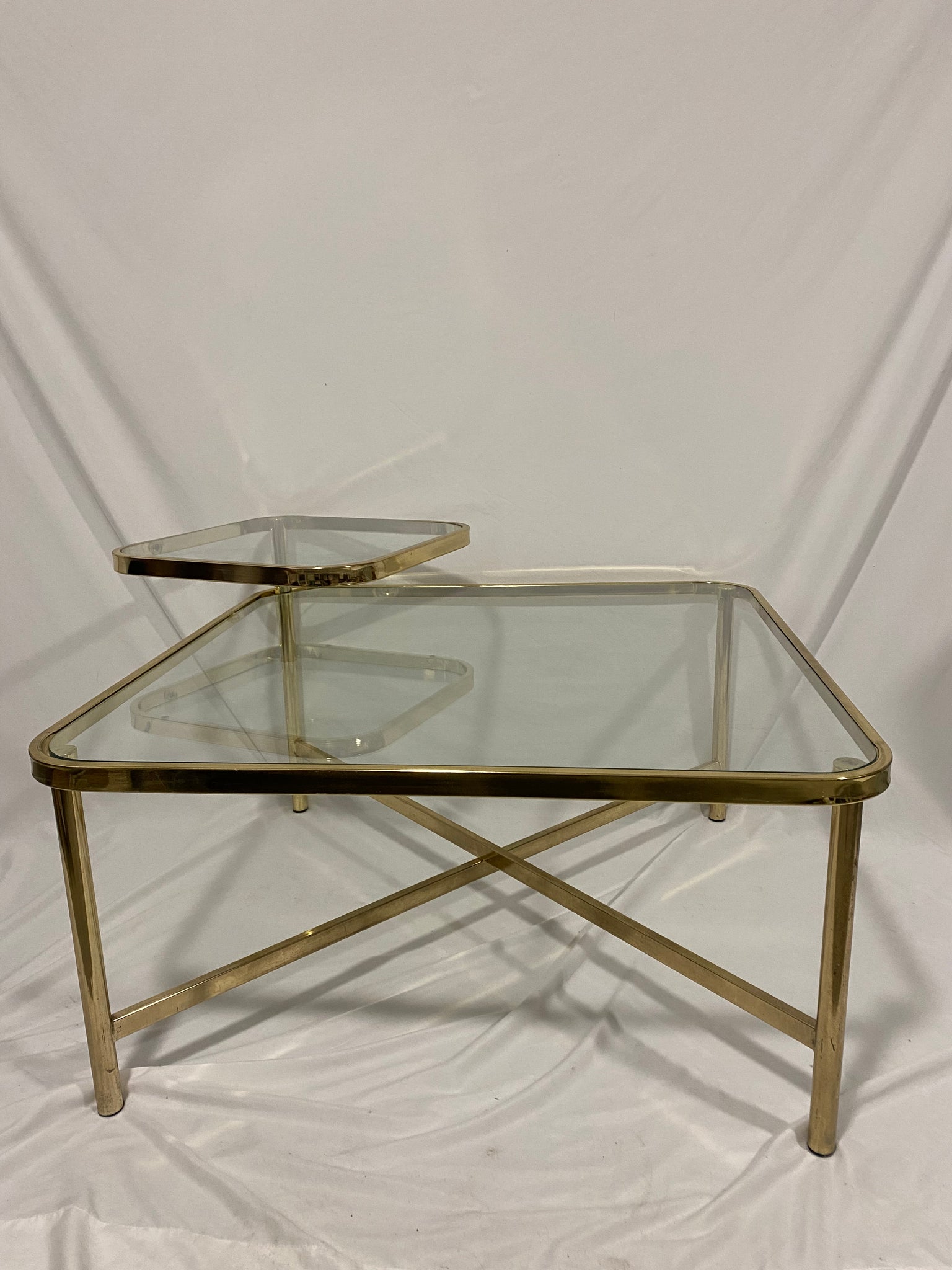 Golden brass square coffee table with swivel tablet