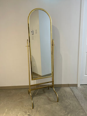 Golden brass swivel floor mirror