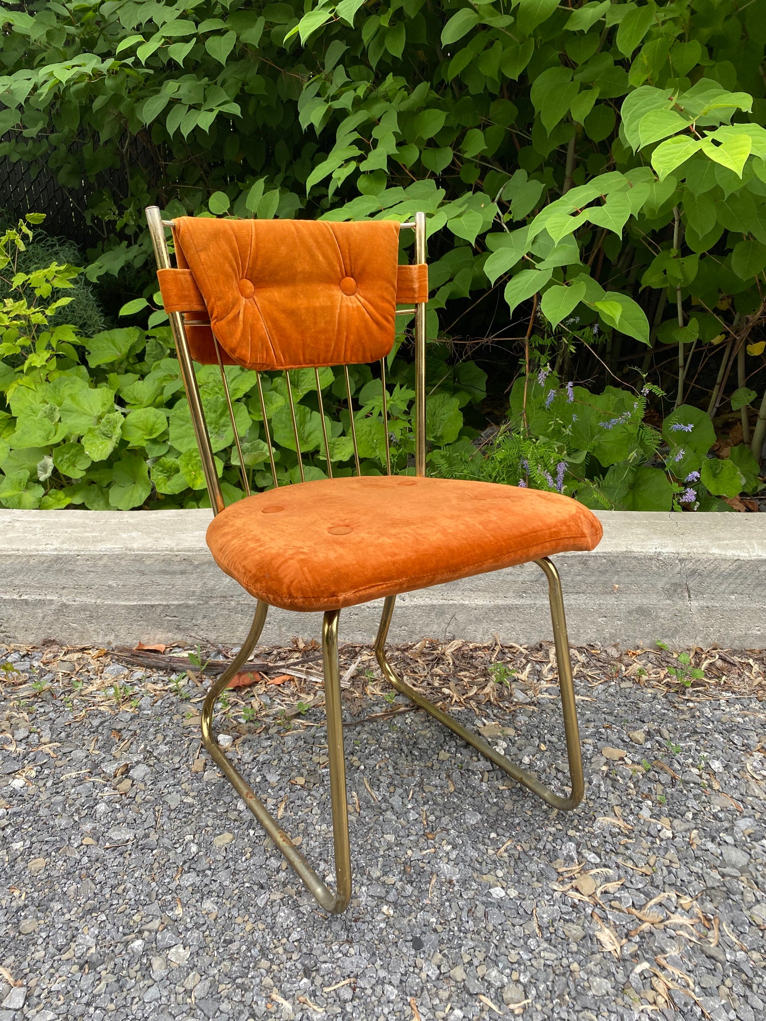 Orange velour & golden brass chairs