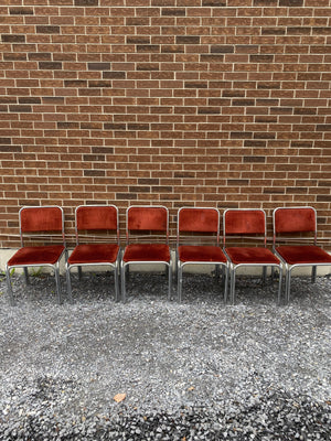 Spotted burnt orange velour & chrome chairs