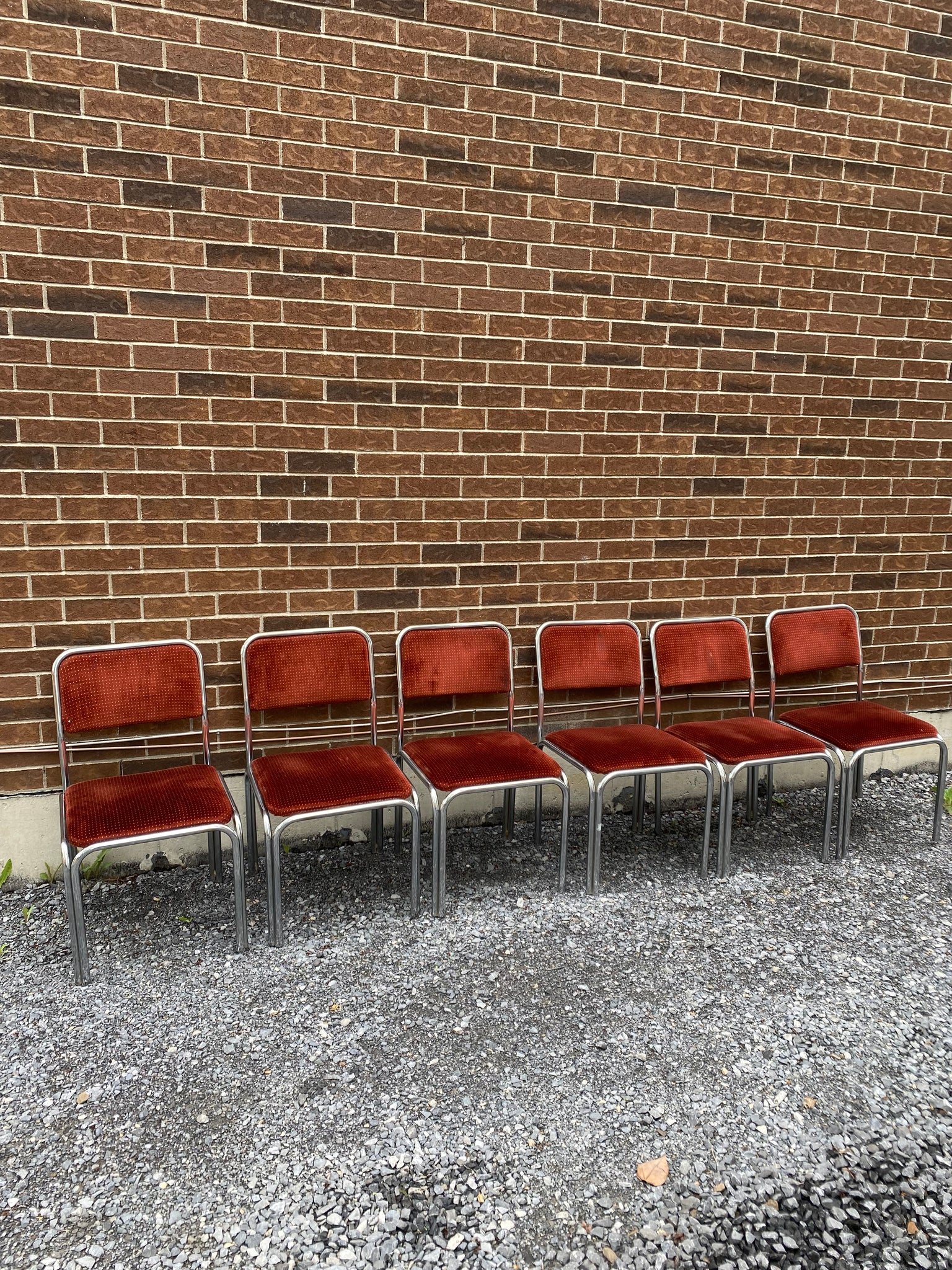 Spotted burnt orange velour & chrome chairs