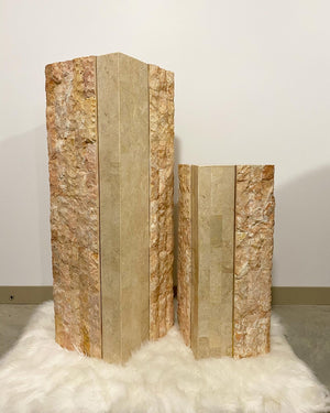 Pink tesselated stone podiums