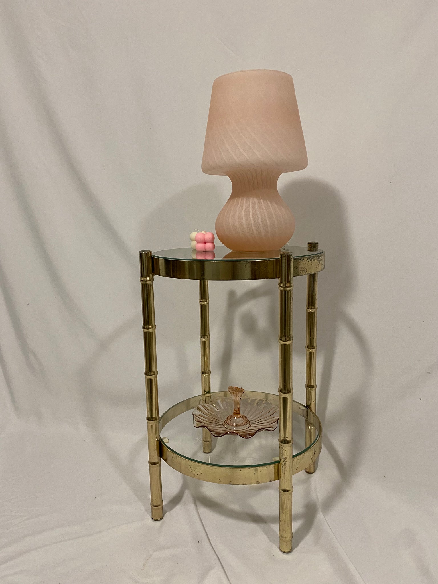 Small cylindrical brass & glass side table