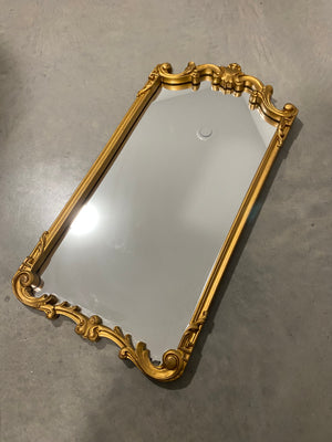 Ornate golden antique mirror