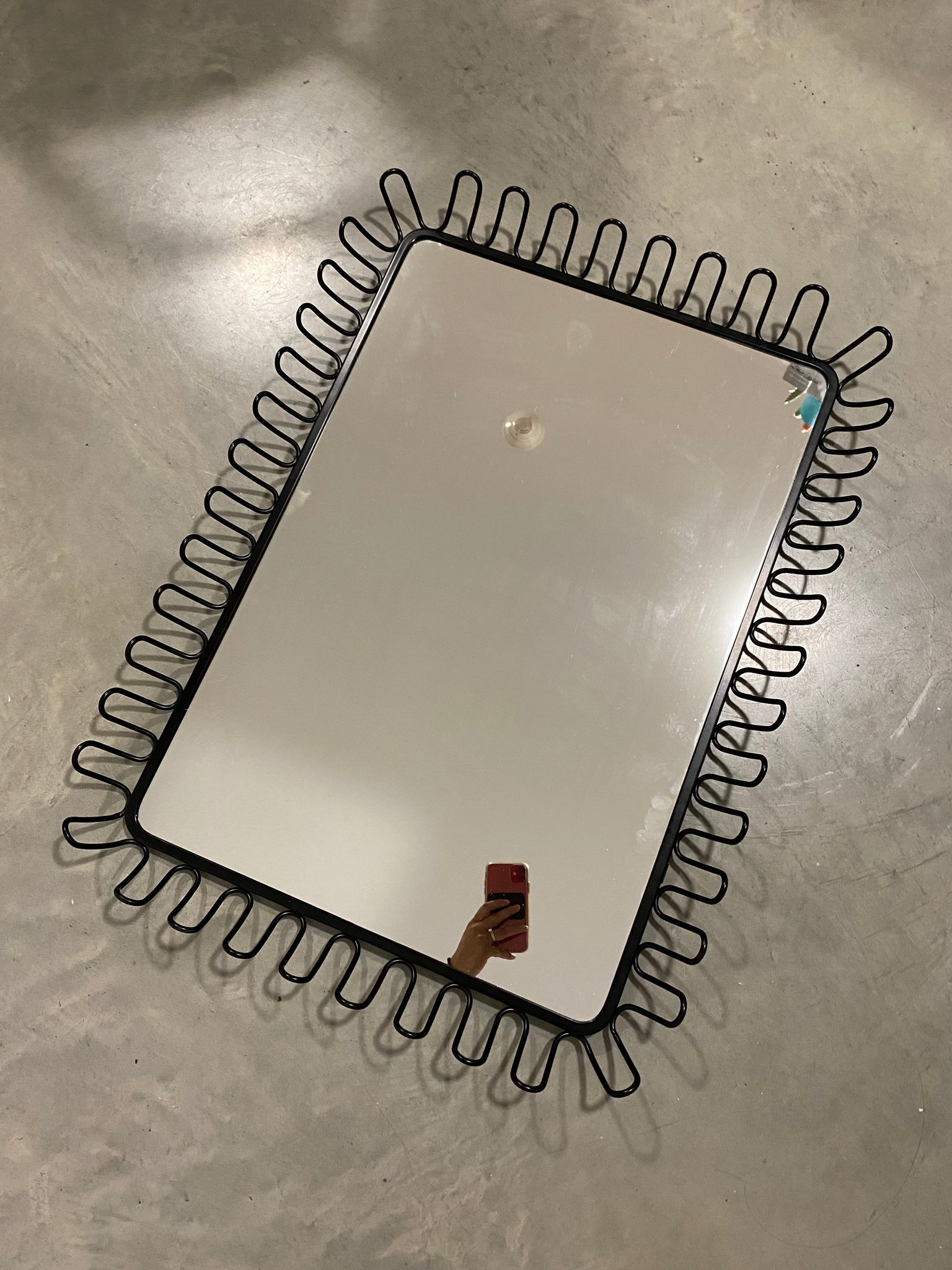 Wavy black metal discontinued IKEA mirror