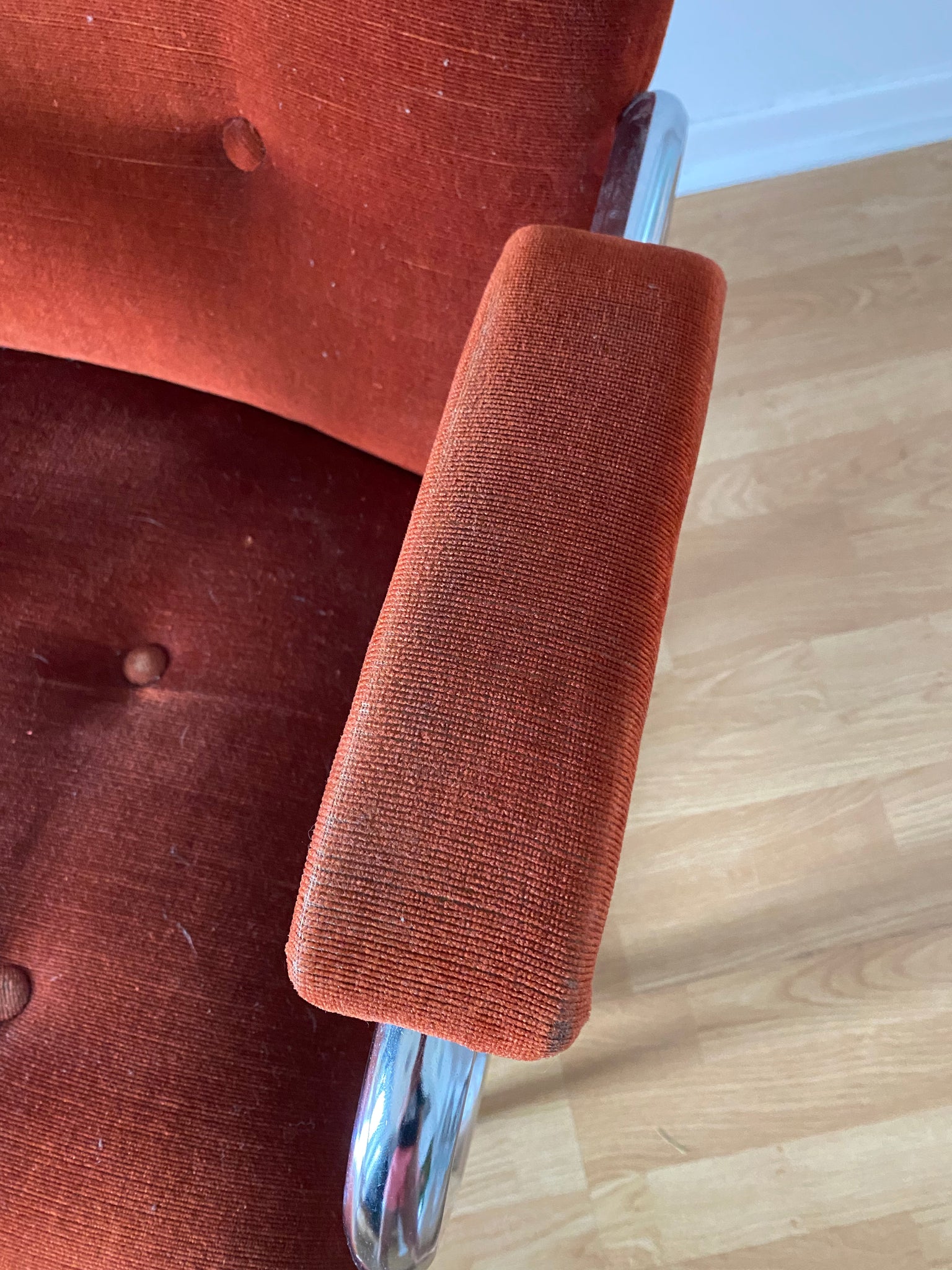 Burnt orange velour & chrome rocking chair