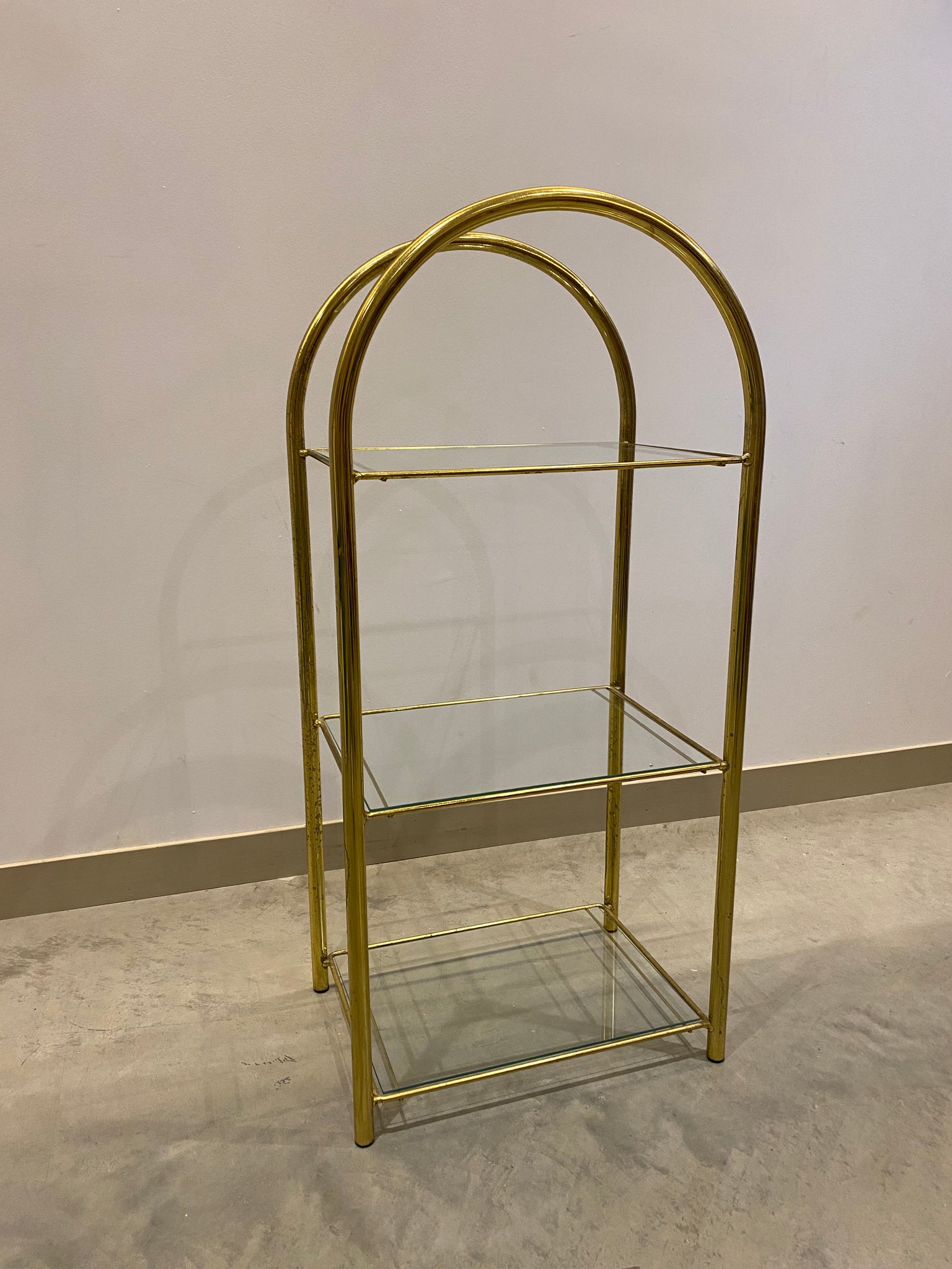 Small arched golden brass shelf