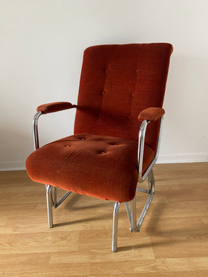 Burnt orange velour & chrome rocking chair