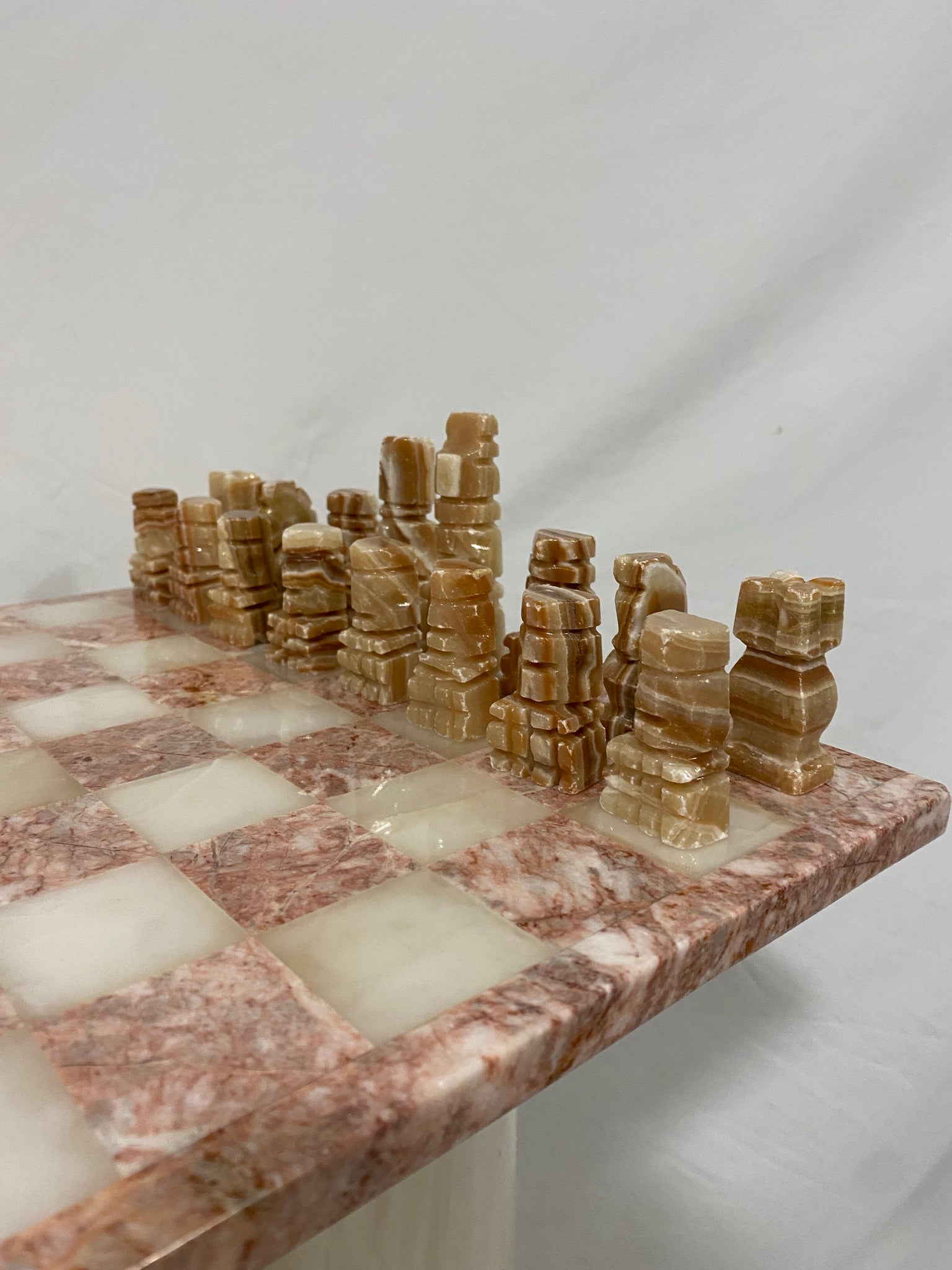Marbled pink onyx chess game