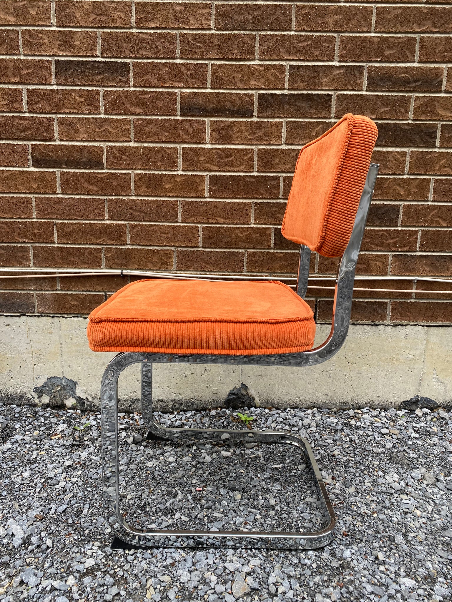 Bright orange velvety chrome cantilever chairs Turquoise s