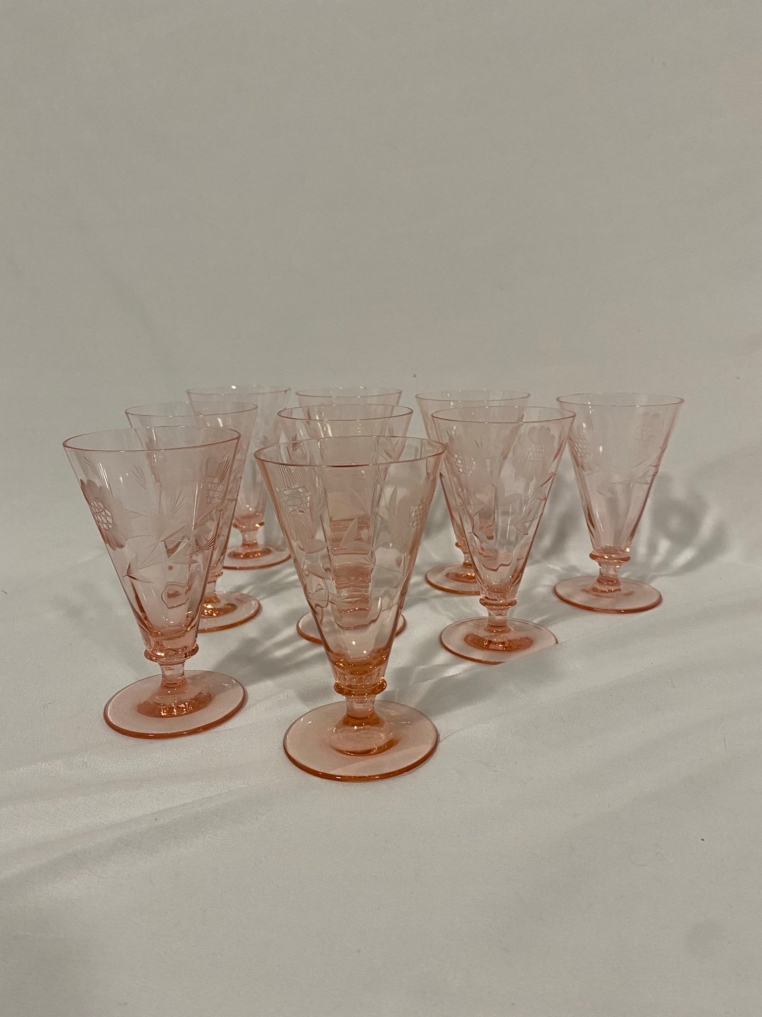 Selection of pink depression glass style glasses