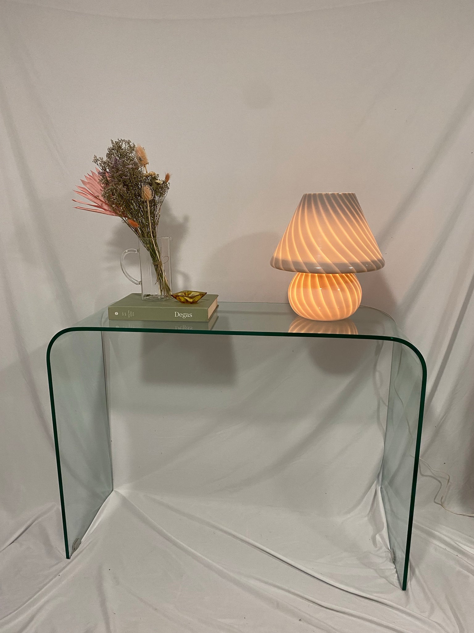 Gorgeous glass waterfall console table