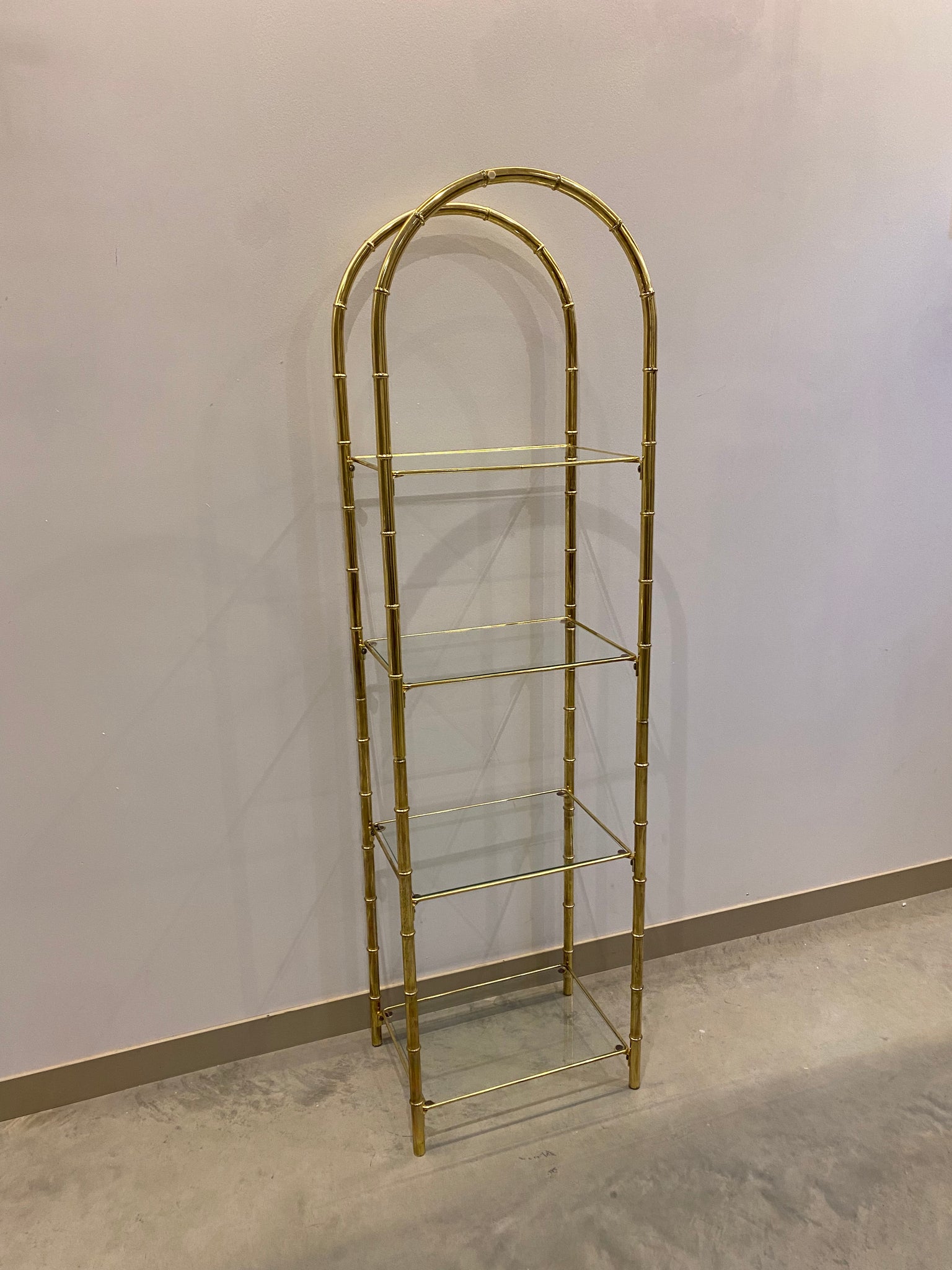 Hollywood regency brass & glass arched shelf