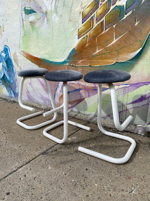 White paperclip bar stools