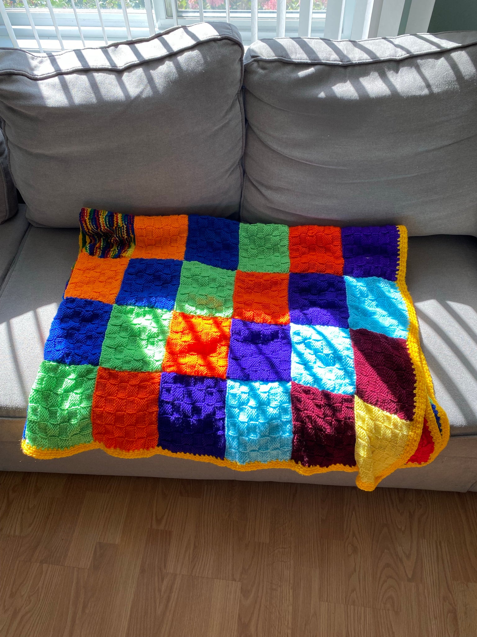 Colorful squares knitted blanket