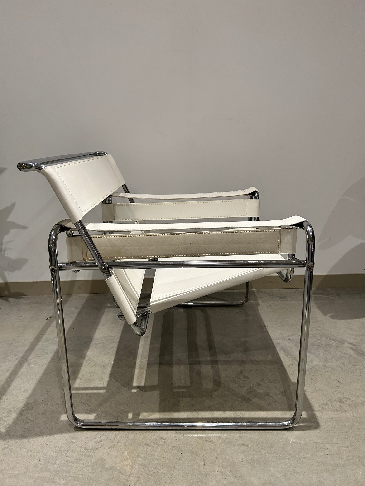 White Marcel Breuer Wassily style chairs